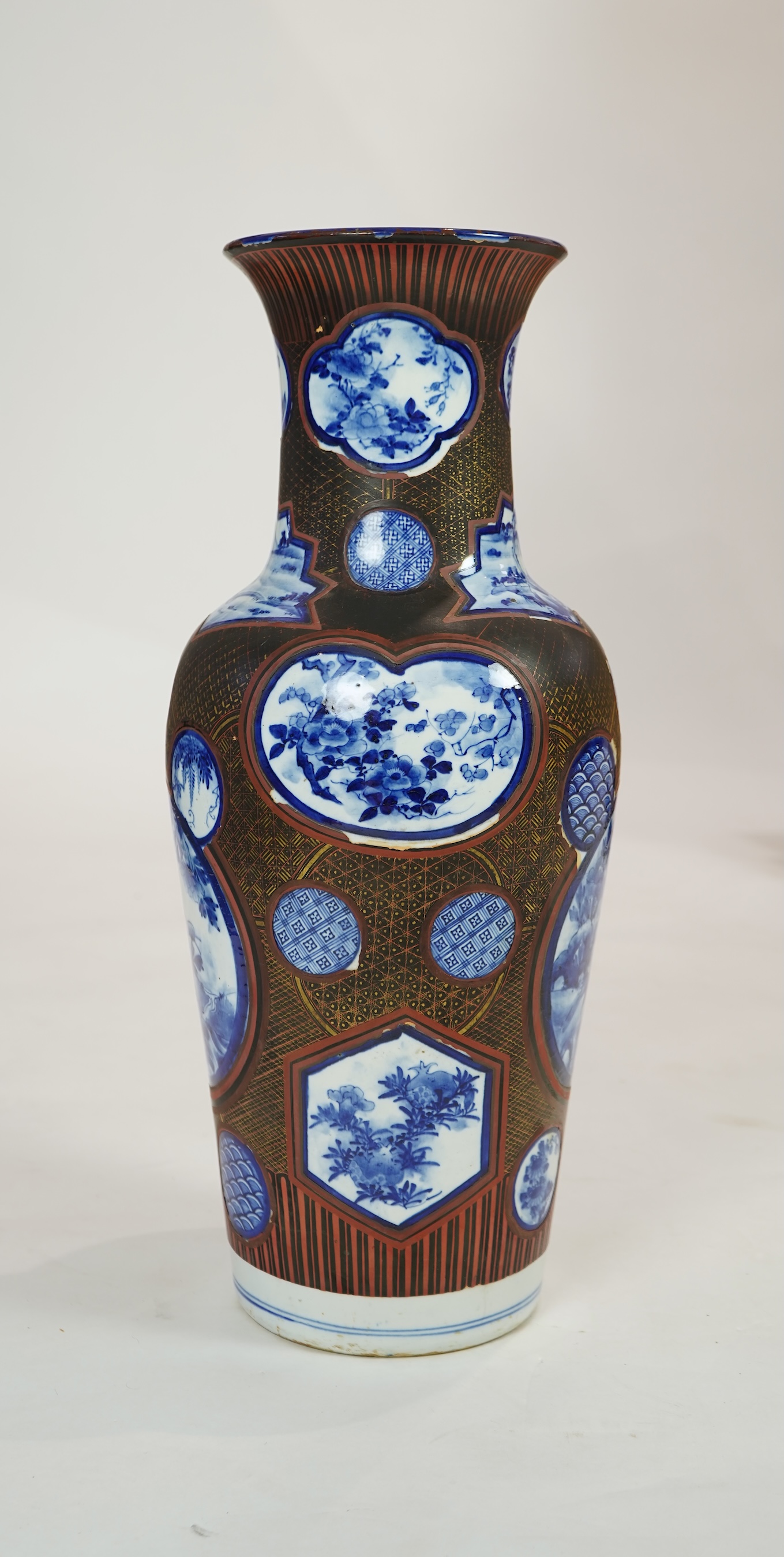 A large Japanese blue and white and gilt lacquered vase, late 19th century